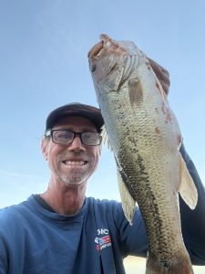 Big Hoss holding a large largemouth bass
